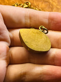 Brass Set Glass Eye Necklace