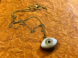 Brass Set Glass Eye Necklace