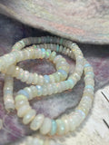 White Opals-- Faceted rondelles, Full strand