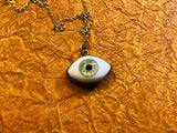 Brass Set Glass Eye Necklace