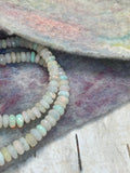 White Opals-- Faceted rondelles, Full strand